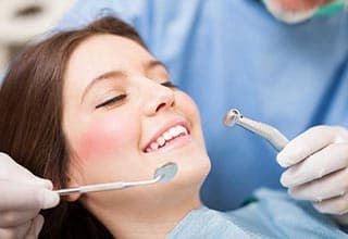 dentist and patient in dental office